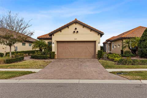 Photo of 8424 Alberata Vista Drive, Tampa, FL 33647 (MLS # O6429444)