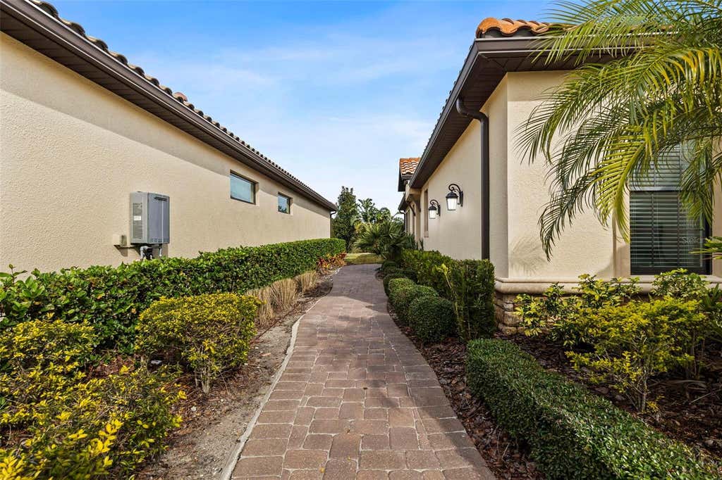 Photo of 8424 Alberata Vista Drive, Tampa, FL 33647 (MLS # O6429444)