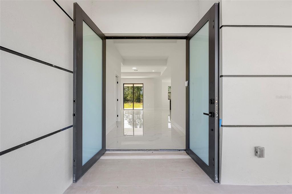 Photo of 618 Raintree Street E, Lehigh Acres, FL 33974 (MLS # S5137990)