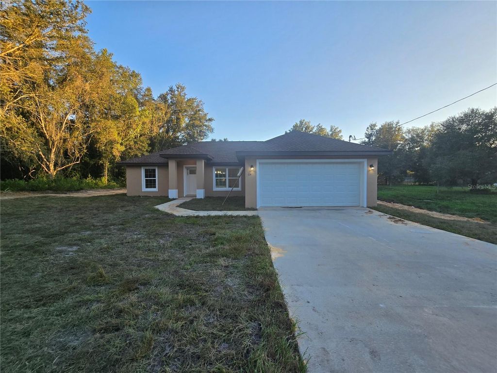 Photo of 64 Locust Run Radial, Ocala, FL 34472 (MLS # OM711693)