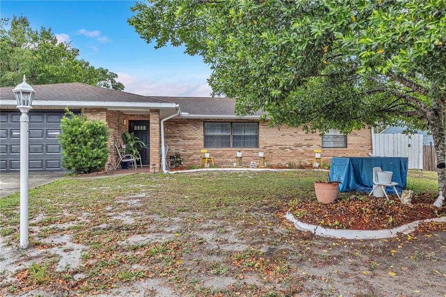 Charming and well-maintained 2-bedroom, 2-bath brick home located in Deltona. This property features no carpet throughout, a fully fenced oversized backyard, and a spacious layout ideal for comfortable everyday living. A standout feature includes a porch with central air conditioning, offering additional flexible living space year-round. The home sits on a large lot in a quiet residential area and conveniently located near Walmart, restaurants, supermarkets, gas stations, and pharmacies, providing exceptional everyday convenience. Conveniently located near major roads with easy access to shopping, dining, and schools. Move-in ready and ideal for first-time buyers, or investors seeking a solid property in a desirable Central Florida location.