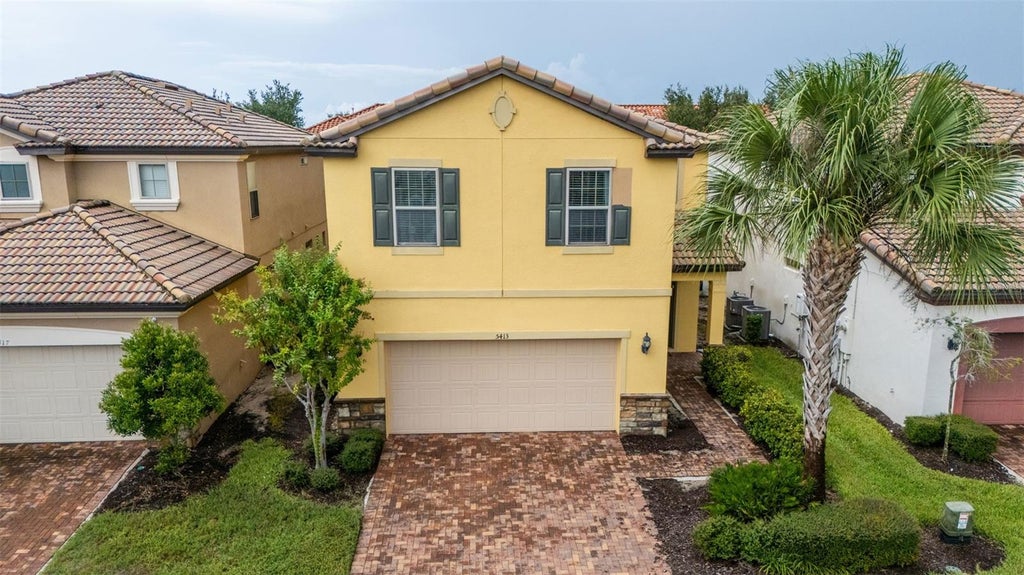Photo of 5413 Misty Oak Circle, Davenport, FL 33837 (MLS # O6438845)