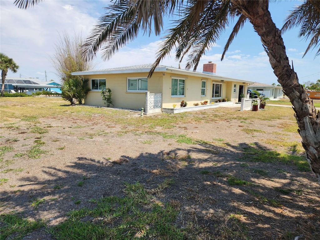 Photo of 1447 Lemon Bay Drive, Englewood, FL 34223 (MLS # TB8385048)