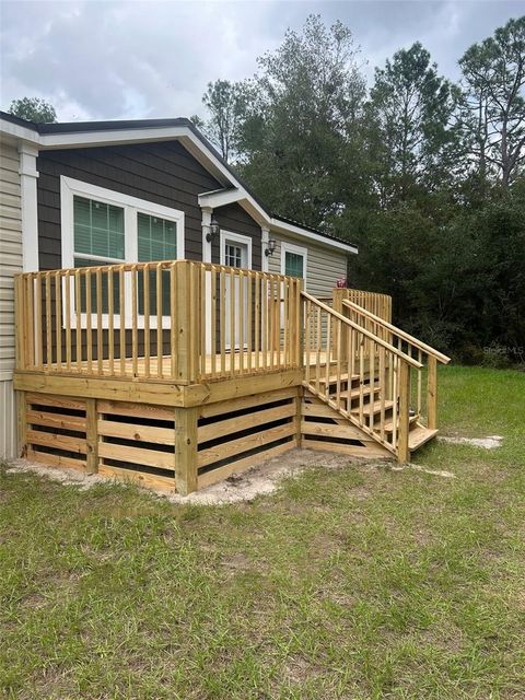 Tiny photo for 10865 NE 220th Street, Fort Mccoy, FL 32134 (MLS # OM710113)