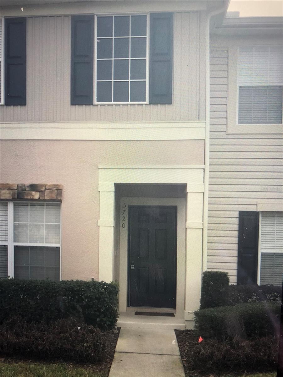 See this beautiful two-bedroom, two-bath townhome in the desirable gated community of Fishhawk Ridge. Freshly painted throughout with beautiful dark vinyl wood flooring downstairs area and lots of natural light. From the front entrance you walk into a spacious dining/flex area that leads to an open, updated kitchen with dual pantry's, wood cabinets and even a coffee bar! There is a guest bath, large under-stair storage, and a large family room with sliding glass doors to your private screened-in patio overlooking a serene conservation area. Upstairs you'll find two en-suite bedrooms with large dual closets and a laundry closet with full-size washer and dryer. Fishhawk Ranch amenities include parks, trails, aquatic park, pools, tennis courts, clubhouses, excellent schools and more. Close to everything but secluded and secure, this one will lease quickly - call now to schedule a showing!