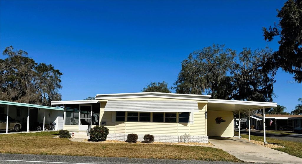 Photo of 501 Palo Verde Drive, Leesburg, FL 34748 (MLS # R4910602)