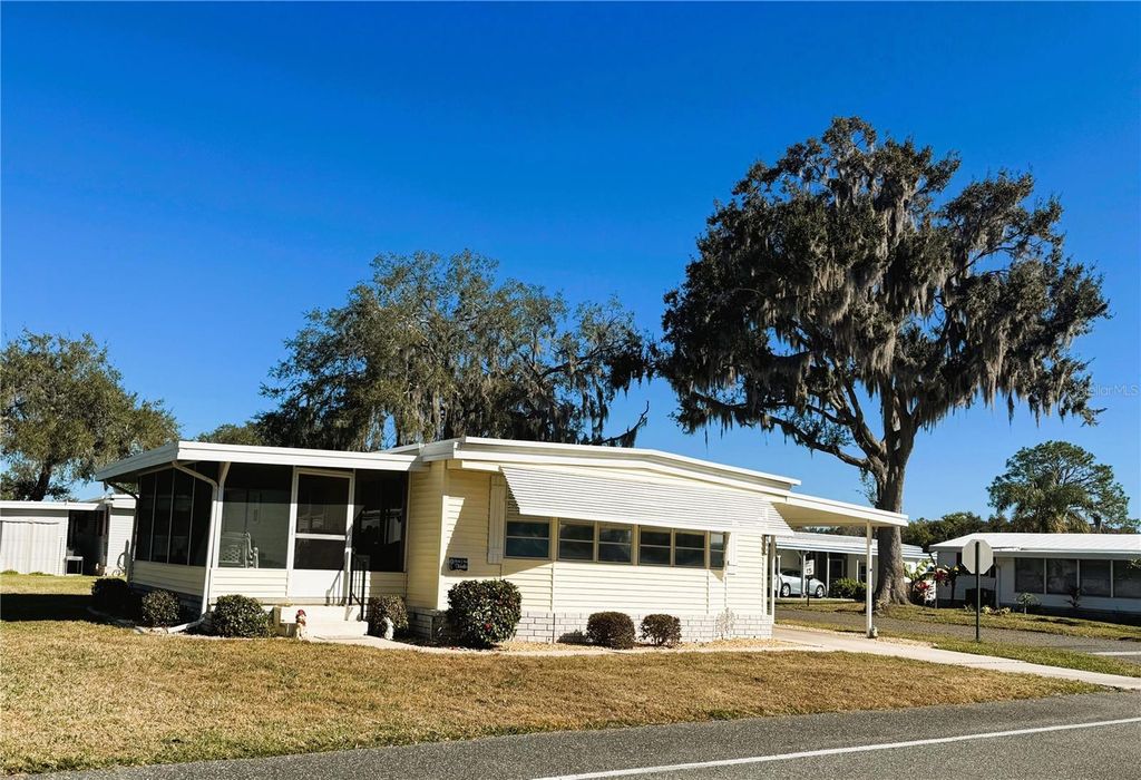 Photo of 501 Palo Verde Drive, Leesburg, FL 34748 (MLS # R4910602)