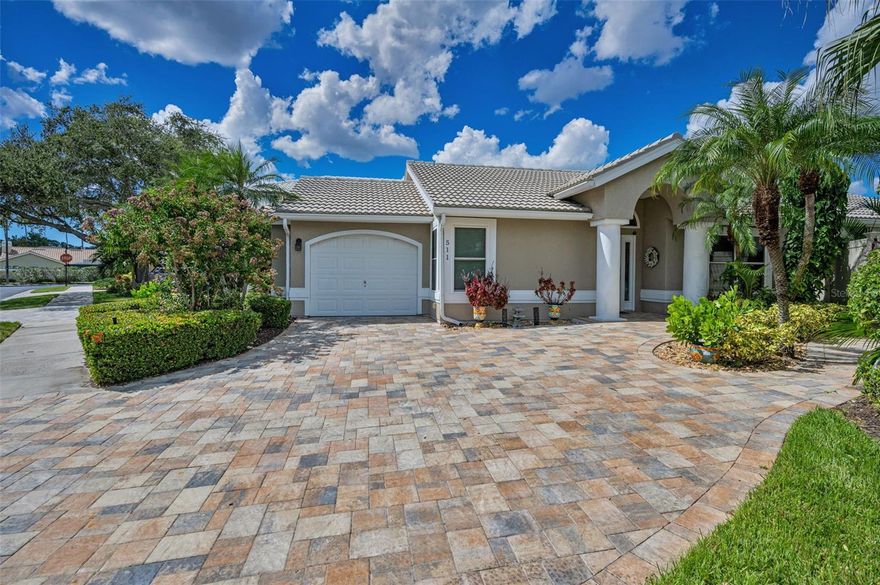 Seller motivated!  Welcome to this beautifully maintained, move in ready 2-bedroom, 2-bath home with a versatile flex room in the highly sought-after Georgetown community of Safety Harbor. Inside, you’ll find fresh interior paint (2024), luxury upgraded laminate flooring in the main living areas a second bedroom and office (flex room) , A cozy woodburning fireplace anchors the living room. The spacious open kitchen is finished with granite countertops and sleek black stainless steel appliances.   Newer top-of-the-line lighting fixtures throughout the home add a modern and refined touch. Both bedrooms include a walk-in closet. The primary suite has French Doors that open directly to the pool area. The en-suite bathroom will wow you with newly updated  quartz countertops, a soaking tub, and a walk-in shower.  The guest bathroom has been tastefully updated to reflect a beautiful walk in shower and quartz counter top vanity.

The backyard is designed for relaxation and entertaining with a resurfaced pool (2022), new pool tiles (2-3 years), pool timer mechanism (2-3 years), pool pump (5 years) under a screened birdcage enclosure of which the screens were rescreened within the last 5 years and an  extended paver patio installed in 2021, all within a private setting.  Major updates provide lasting peace of mind, including a 2024 AC system with a transferable 12-year warranty (11 years remaining, transferable for $75), newer hurricane-rated windows and doors    (excluding the french doors in the primary bedroom and kitchen), a tile roof completed in 2009, a newer hurricane rated front door, side panels and half moon window above door in 2022, a super gutter added in 2020, and extended driveway pavers in 2021.. The HOA is responsible for the front lawn maintenance including the shrubbery.
Safety Harbor is known for its small-town charm and vibrant waterfront lifestyle. Just minutes away, you’ll find the walkable downtown district filled with locally owned shops, restaurants, and community events. The historic Safety Harbor Spa offers world-class wellness and resort amenities, while the Marina and Waterfront Park provide scenic views of Old Tampa Bay. Nearby Philippe Park, one of Pinellas County’s most treasured parks, offers shaded picnic areas, walking trails, and access to the water, making this location truly special.
This meticulously maintained home will not last long on market!