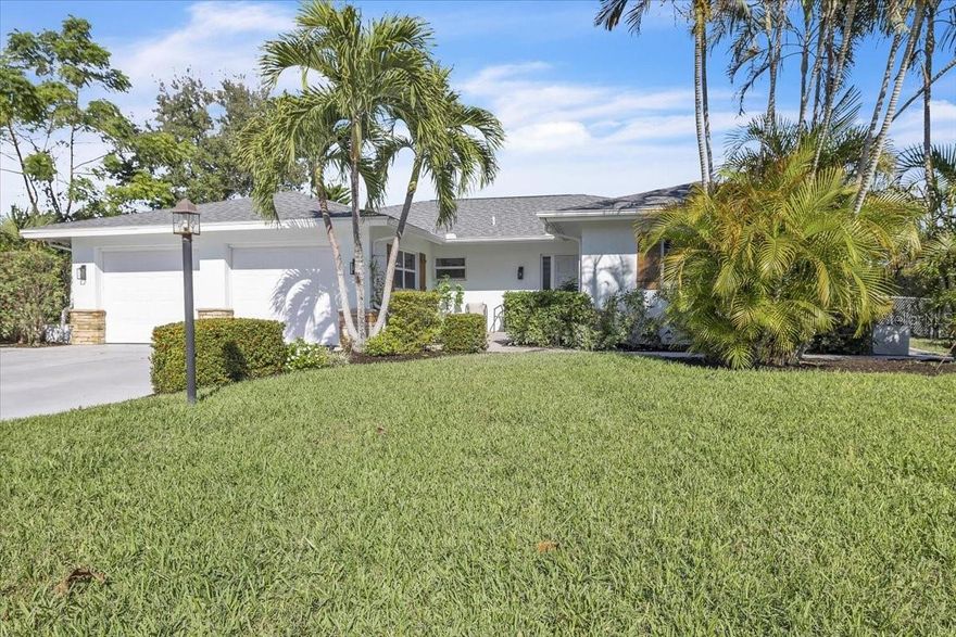Location, location, location! Siesta Key - Private Boat Slip - Completely Updated - NOT in a FLOOD ZONE & No Hurricane damage!! Situated on Avenue C just before the South Siesta Key Bridge, this beautifully updated home offers an unbeatable coastal lifestyle. Enjoy less than a mile walk to the world-famous Siesta Key Beach, where you can take in stunning sunsets, white sand beaches, and relaxing weekends by the water. Boaters will love the easy access to the Intracoastal, just minutes away, with approximately 15 minutes to reach the Gulf of America. The home is also within walking distance to local restaurants and beaches, while being tucked inside a peaceful bird sanctuary, offering a rare blend of convenience and natural surroundings. Inside, the home has been fully updated. Improvements completed in 2020 include a NEW ROOF, tile flooring throughout, a brand-new kitchen, and updated bathrooms. The floor plan offers three bedrooms, including a SECOND PRIMARY SUITE, three bathrooms, and an oversized two-car garage. The backyard is designed for true Florida living, featuring a large heated pool, a spacious lanai with new panoramic screening, and a PRIVATE BOAT SLIP, one of only two slips in the entire neighborhood. The pool was resurfaced with new tile in 2025, and the dock was completed in 2025 as well. This home captures the best of coastal Florida living with walkability, boating access, and thoughtful updates throughout. Enjoy the neighborhood with a short walk to popular spots including Daiquiri Deck, Siesta Key Oyster Bar, Captain Curt’s Crab & Oyster Bar, The Old Salty Dog, Abel's ice cream, Ruth’s Chris Steak House, and Carrabba’s Italian Grill. With Publix Super Market and shopping just down the road, you can enjoy peace and quiet while still being close to everything you need. Schedule your own personal tour today!
