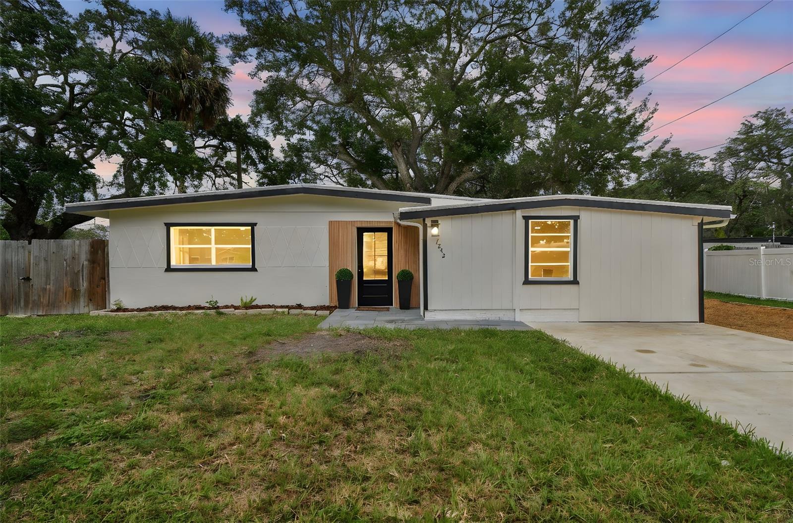This beautifully remodeled home in the heart of Port Richey is a very unique property, boasting 4 bedrooms and 3 bathrooms, there are endless possibilities for the enjoyment of this property, this gorgeous new Kitchen boasts Quartz counter tops, brand new stainless steel appliances, new water heater, modern front door, a new sliding door that leads to the spacious back yard, new flight fixtures, vanities and so much more! This property is also a phenomenal investment property with the potential of bringing multiple sources of income. Close to downtown New Port Richey and all the amazing restaurants in the area.