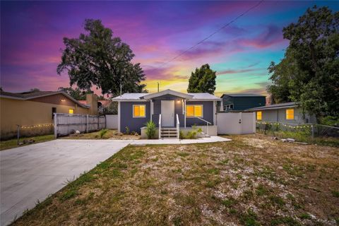 Photo of 8738 N Tangerine Place, Tampa, FL 33617 (MLS # TB8505989)