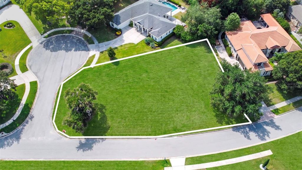 Photo of 47 Osprey Pointe Boulevard, Clermont, FL 34711 (MLS # O6406268)