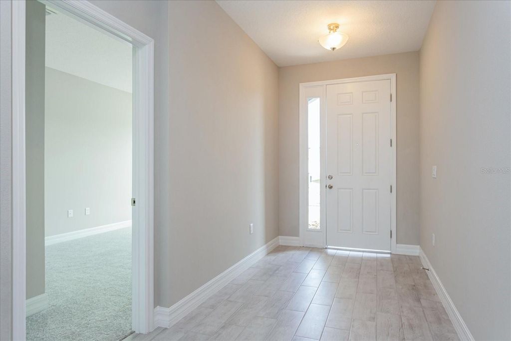 Photo of 648 Silver Palm Drive, Haines City, FL 33844 (MLS # G5103217)
