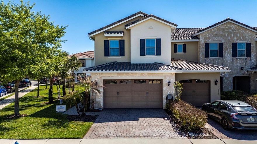 Located in the desirable Eagle Creek community in Lake Nona, this well-maintained corner-unit townhouse offers 3 bedrooms, 2.5 bathrooms, and 1,828 sq ft of comfortable living space. Built in 2017, the home features a bright open layout with ceramic tile on the first floor and upgraded wood flooring upstairs.

The kitchen includes granite countertops, stainless steel appliances, white cabinetry, and a breakfast bar. Upstairs, the primary suite offers tray ceilings, a walk-in shower, and a private bath. Two additional bedrooms and a laundry room complete the second floor.

Enjoy a private paver patio, garage access, and multiple upgrades including custom closets, added storage, and a UVC light system in the AC for improved air quality.

Community amenities include pools, fitness center, tennis and basketball courts, playgrounds, and walking trails. Conveniently located near Lake Nona Medical City, shopping, dining, and major highways.