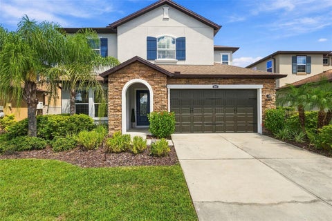 Photo of 28907 Revaro Lane, Wesley Chapel, FL 33543 (MLS # TB8547009)