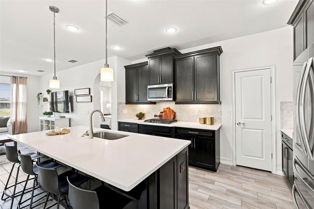 Photo of 28907 Revaro Lane, Wesley Chapel, FL 33543 (MLS # TB8547009)