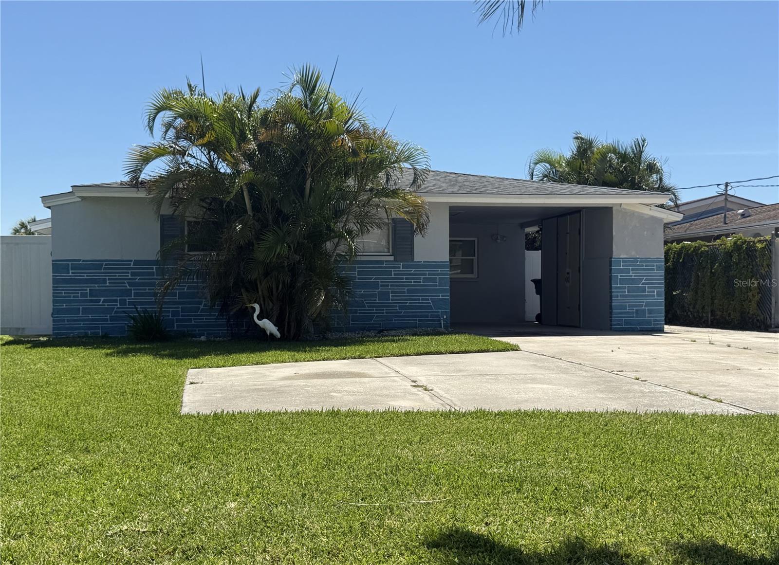 Live the dream in this beautiful 3-bedroom, 2-bathroom waterfront home with direct canal access—perfect for boating enthusiasts! It is your chance to live the boating lifestyle you've always dreamed of. Tucked in along a quiet canal with direct boating access. This home is perfect for those who love being on the water. Whether you're heading out for a day of fishing, cruising the open water, or just relaxing by the dock, this home makes it easy. There's even a private dock where you can fish and keep your boat ready to go anytime. As a resident of Gulf Harbors, you'll have access, with a very small yearly fee, to a private, members-only beach with cabanas, picnic areas, sand volleyball and stunning views of the Gulf of Mexico. Inside, you'll find a bright and open layout, with a spacious living area, a fully equipped kitchen and comfortable bedrooms. In addition to the open living room/Kitchen area, there are 2 addition non-bedrooms overlooking the large lanai and the water. This home is located in a quiet and friendly neighborhood that is only still 1 minutes drive away from Hwy 19 and all of the shopping, restaurants and everything easily found there. Appliances all working and available to use by tenants, but repairs are tenant responsibility. Partial furnishing is optional.