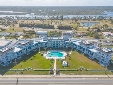 Photo of 3510 S Ocean Shore Boulevard #218, Flagler Beach, FL 32136 (MLS # V4941181)