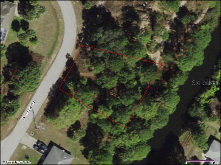 Beautiful, wooded, freshwater canal, oversized lot located in the heart of North Port. Drink your morning coffee, kayak, paddleboard, or enjoy gorgeous Florida sunsets from your very own back yard waterway. If you are thinking of building or investing in real estate, this may be the perfect property for you. Close to boating, fishing, shopping, beaches, restaurants, schools, public boat ramps and area attractions. Adjacent lot (36) is available for sale on a separate listing