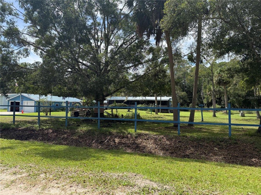 Photo of 1844 Papaya Street, Bunnell, FL 32110 (MLS # FC321694)