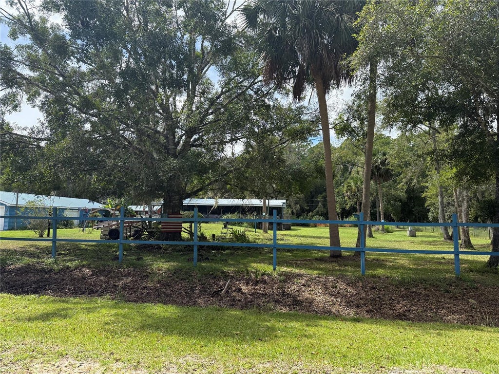 Photo of 1844 Papaya Street, Bunnell, FL 32110 (MLS # FC321694)