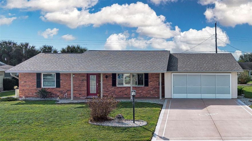 Such a cream puff!  Spotless 2 bedroom/ 2 bath single family home in a NON HOA neighborhood with fencing allowed.  Enter through a beautiful lead glass door and discover a living room/dining room with an open passthrough window into the kitchen- updated with solid wood cabinets, granite counters and newer appliances. Gorgeous wood laminate flooring in main areas and new carpet in the bedrooms. The primary ensuite bathroom is updated with a easy step shower and the main bathroom has a shower/tub combo.  This home has updated double pane windows with pre-drilled storm covers. The laundry room has double doors adaptable for golf cart storage.  The two-car carport has an opaque privacy screen door. Recent improvements include ** NEW ROOF 2025 ** NEW ELECTRIC PANEL 2025**NEW LIGHTING 2025** NEW INTERIOR PAINT 2025**WATER HEATER 2021**CPVC SUPPLY PIPES. The updated screen lanai is perfect for relaxing and outdoor dining. The seller is leaving the lanai furniture for the new owner. All other  FURNITURE CAN BE PURCHASED FROM THE SELLER UNDER SEPARATE NEGOTIATION . Located a short ride away to the Community Association’s central campus with a large array of fun activities enjoy.  Sun City Center has been named the #1 retirement community in the USA. This golf cart assessable community has all the services you need including recreation, clubs and activities, volunteer opportunities, stores, medical facilities, financial services, and houses of worship. Minutes away is I 75 linking to a short drive to Tampa, Sarasota and St. Petersburg, near 3 airports, beaches, theater, museums, fine dining, advanced medical, special events and major league sports too. What a great place to be living the dream!