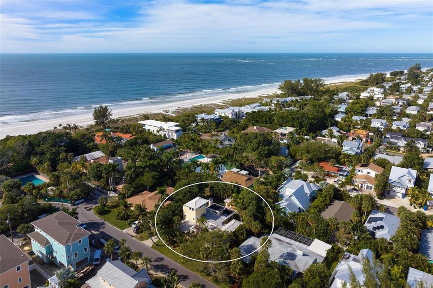 Embrace coastal luxury in this home with direct beach access just three homes to the pristine beaches of Anna Maria Island. This four-bedroom home sits on a generous 12,576 square-foot lot, featuring a light-filled, spacious interior with an open floorplan. The kitchen, dining room, and great room boast 10-foot ceilings, creating an ideal setting for gatherings and entertaining. Sliding doors seamlessly extend the living space outdoors to the refreshing pool and covered cabana, creating a private outdoor retreat. Relax and rejuvenate in this tranquil oasis surrounded by lush tropical landscaping, or retreat to the rooftop balcony to unwind in the hot tub while savoring breathtaking views. Additional features include a second kitchen in the study, impact windows, wood-burning fireplace and solar panels to heat the pool. Only three homes and an easy stroll take you to shimmering blue gulf waters and soft sand, making it an ideal haven for beach lovers. Pine Avenue's shops, galleries, and restaurants are also very close by. Don’t miss this opportunity to make this coastal dream retreat your own.