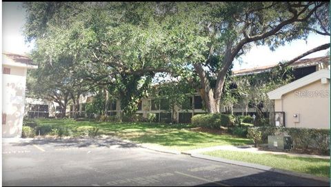 Photo of 14452 Reuter Strasse Cir #710, Tampa, FL 33613 (MLS # TB8512029)