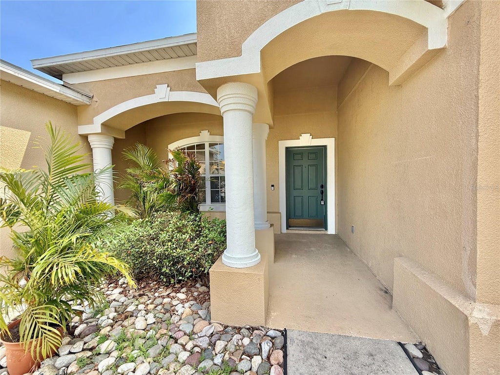Photo of 10181 Marsh Pine Circle, Orlando, FL 32832 (MLS # O6418086)