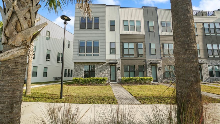 MOVE-IN READY luxury 4-story townhome for rent! This modern residence offers 3 bedrooms, 3.5 bathrooms, a flex space on the first floor, and a rooftop terrace on the top level. The open-concept second floor is filled with natural light and features a chef’s kitchen with KitchenAid appliances, quartz countertops, a large pantry, and a natural gas range. The bedroom level includes a spacious primary suite with a walk-in closet and ensuite bath, plus two additional bedrooms and a full bathroom.