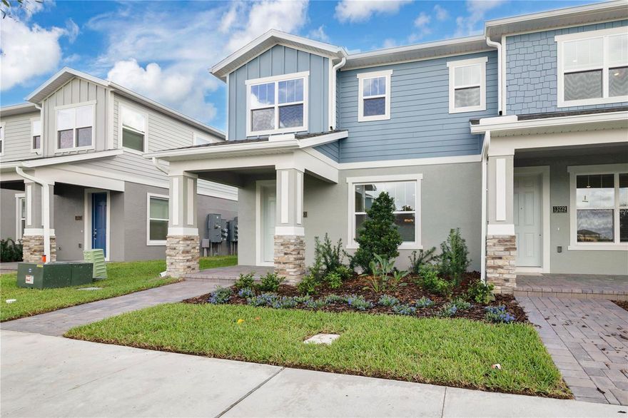 This stunning townhome with 3 bedrooms and 2.5 bathrooms is perfectly situated on a corner lot, offering abundant natural light and enhanced privacy. From the moment you walk in, you'll notice thoughtful upgrades throughout, including 8-foot doors and a modern kitchen featuring elegant quartz countertops with a stylish gray and white color scheme. The home includes a 2-car garage and a private driveway, providing ample parking. A covered breezeway connects the garage to the house, leading to a private courtyard ideal for barbecues and family gatherings. The laundry room includes a utility sink for added convenience, and the luxurious primary bathroom features dual showers, a built-in niche, and elegant gray cabinetry. Located in the desirable Serenade at Ovation community in Horizon West, just 5 minutes from Disney and zoned for top-rated schools, this move-in-ready property is surrounded by green spaces, pocket parks, playgrounds, and a dog park. A rare opportunity to enjoy comfort, convenience, and community in one of Central Florida’s most sought-after locations.