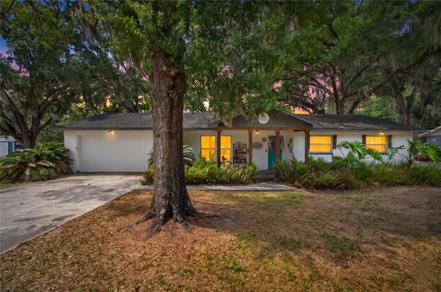 NO HOA + QUARTER-ACRE LOT + MASSIVE OAK TREES + UPDATED KITCHEN + OVERSIZED LIVING SPACES IN THE HEART OF LAKELAND!

Welcome home to this spacious 3-bedroom, 2-bath property sitting on a beautifully shaded quarter-acre lot in Lakeland with NO HOA restrictions! From the moment you arrive, the mature oak trees and inviting curb appeal create a peaceful setting that feels tucked away while still being close to everything you need. Inside, you’ll love the oversized living room with plenty of space to spread out, entertain, or simply enjoy everyday living. Natural light pours throughout the home while the layout flows comfortably from room to room.  ROOF (10 Yrs), HOT WATER HEATER (6 Yrs), HVAC/AC (6 Yrs).

The kitchen has been beautifully updated with UPGRADED CABINETRY, GRANITE COUNTERTOPS, STAINLESS STEEL APPLIANCES, FARMHOUSE SINK, and a striking decorative backsplash that gives the space a warm, custom feel. There’s abundant cabinet and prep space along with an adjoining dining area perfect for hosting family dinners or holiday gatherings.

The split-bedroom layout offers privacy and functionality while all three bedrooms provide comfortable space and great natural light. The primary suite includes its own private bath with walk-in shower, while the secondary bathroom has been refreshed with updated finishes and a clean, bright design.

Step outside and enjoy the freedom of a FULLY FENCED BACKYARD with room for pets, play, gardening, or future additions. The large back deck creates the perfect outdoor setup for grilling, relaxing under the trees, or entertaining guests year-round. The oversized 2-CAR GARAGE provides excellent storage and workspace flexibility.

Located in the heart of Lakeland, you’ll enjoy quick access to shopping, restaurants, grocery stores, medical facilities, parks, and major roadways for an easy commute throughout Central Florida.

If you’ve been searching for space, character, mature landscaping, and NO HOA restrictions all in one property, this is the one. Schedule your showing TODAY!