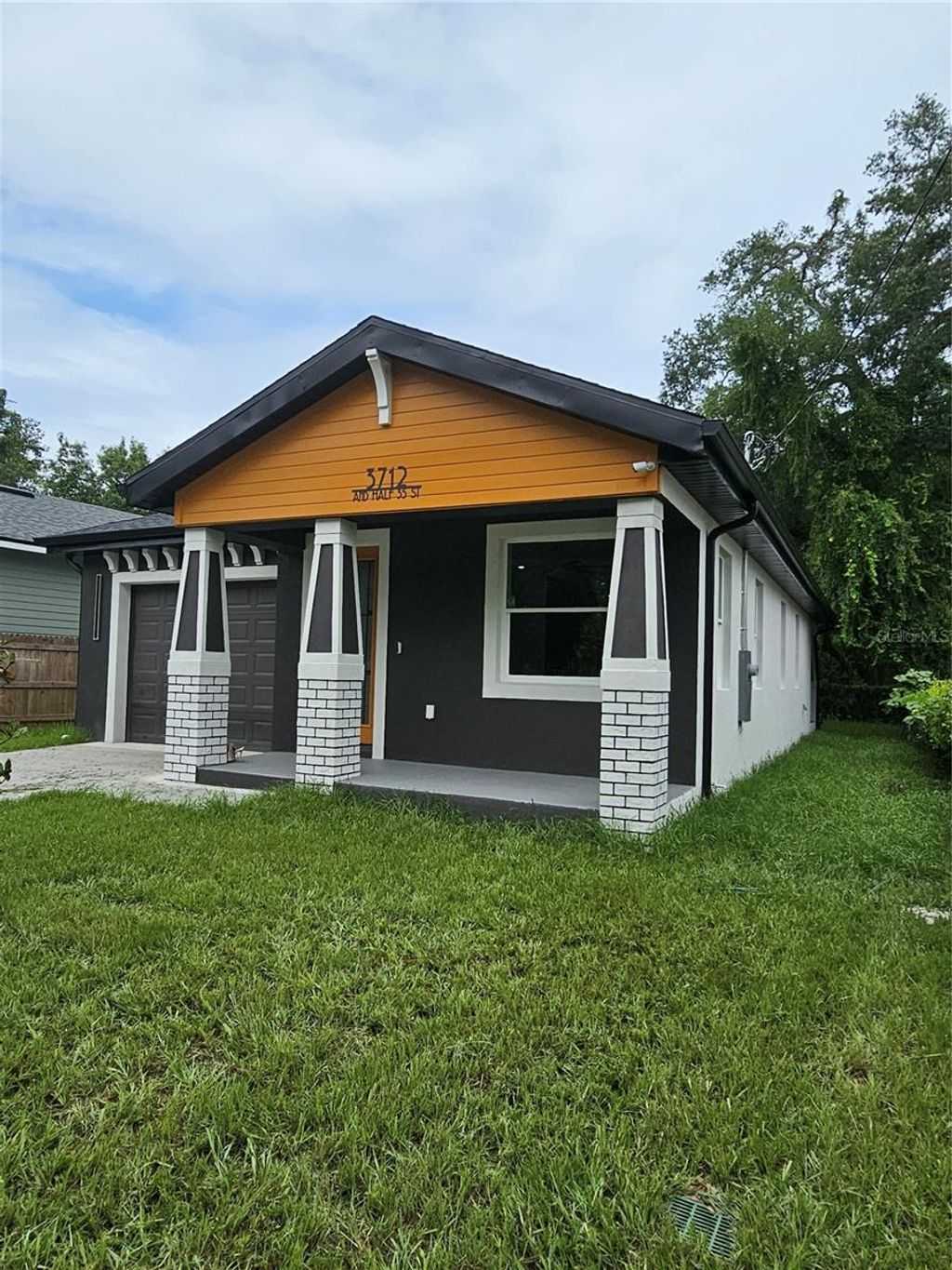 Photo of 3712 N 35th Street #1/2, Tampa, FL 33610 (MLS # TB8403399)