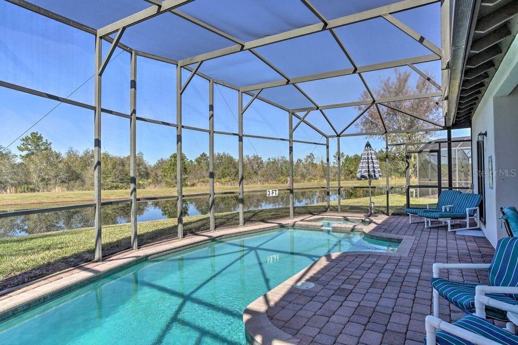 Photo of 16704 Lazy Breeze Loop, Clermont, FL 34714 (MLS # O6360383)