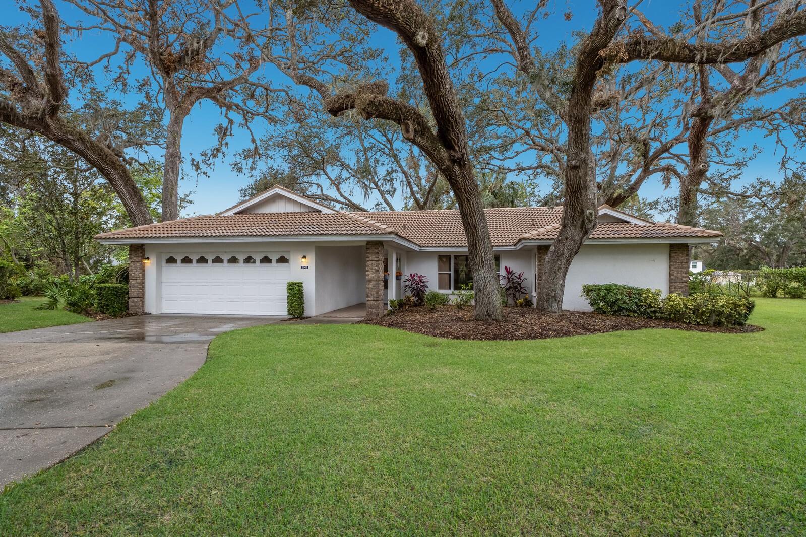 Located in the welcoming Garden Lakes community, this charming 3-bedroom, 2-bathroom free-standing home offers a blend of comfort and convenience in a vibrant 55+ gated neighborhood. The open floor plan boasts vaulted ceilings for a spacious feel, a wet bar perfect for entertaining, and a practical split-bedroom layout for privacy. The eat-in kitchen provides a cozy space for meals, while the bright Florida room offers additional living space to enjoy. A 2-car garage and laundry room completes the home, offering plenty of storage. This maintenance-free community features fantastic amenities, including a clubhouse, fitness, pool, shuffleboard, tennis, and pickleball, creating an active and social lifestyle. Pet-friendly and conveniently located near shopping and dining, this home is an excellent opportunity to bring your designer touches and enjoy Florida living at its best.