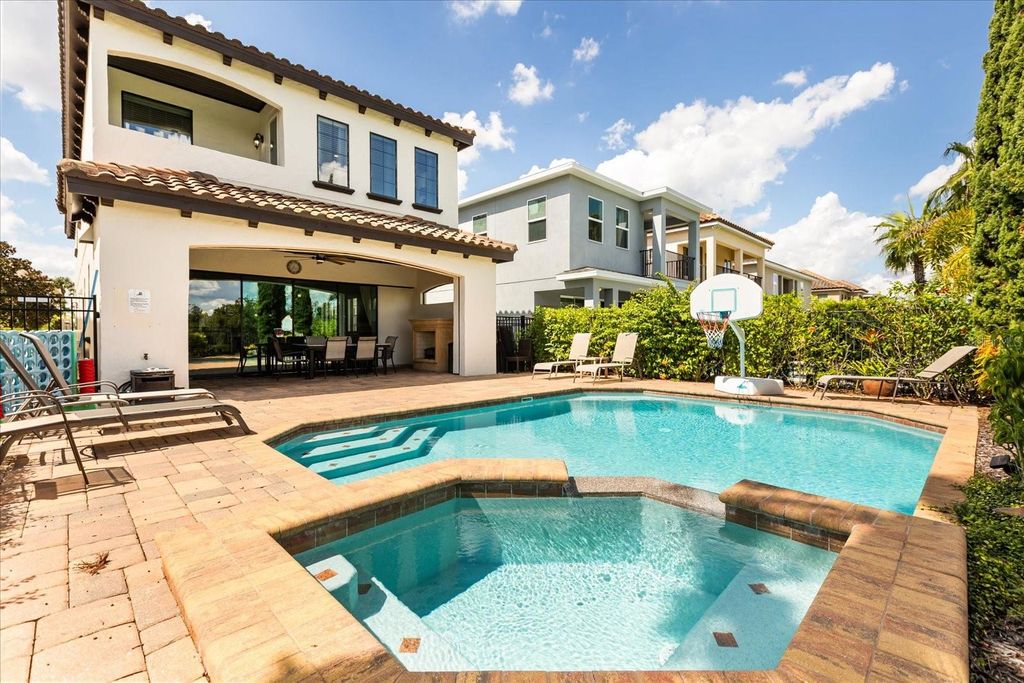 Photo of 1097 Castle Pines Court, Reunion, FL 34747 (MLS # O6348333)