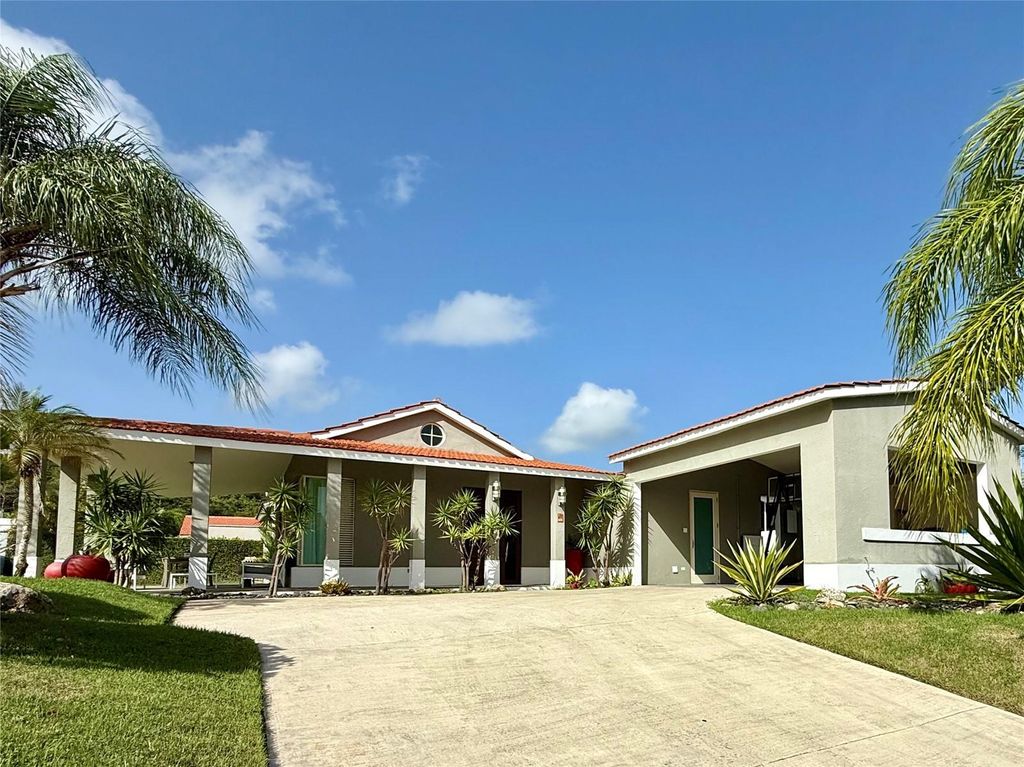 Photo of 528 Camino De Guilarte Street, Dorado, PR 00646 (MLS # PR9116595)