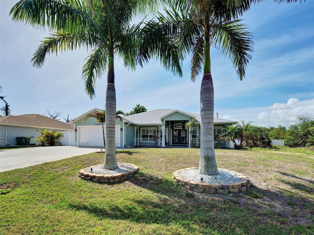Photo of 13679 Drysdale Avenue, Port Charlotte, FL 33981 (MLS # TB8552447)