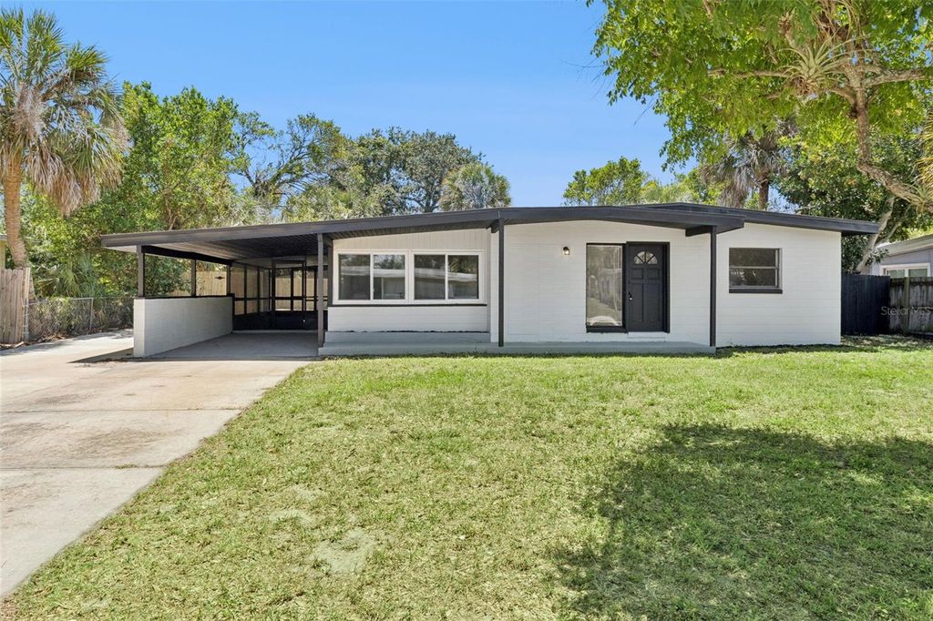 Photo of 1465 Hillcrest Drive, Melbourne, FL 32935 (MLS # O6410181)