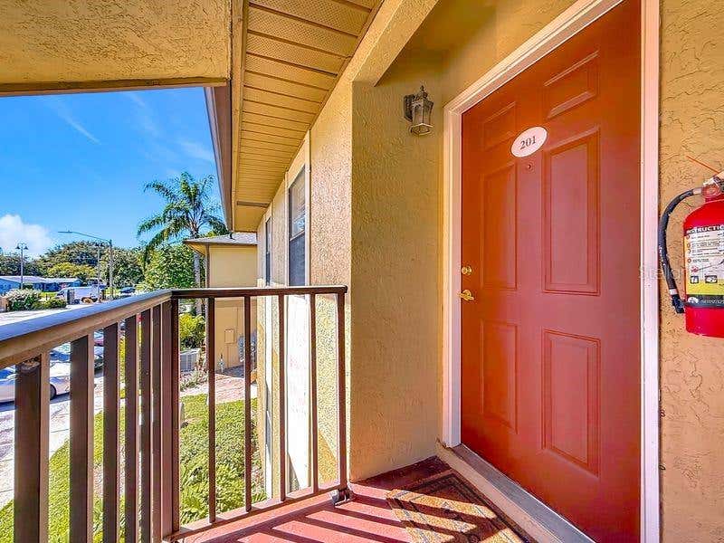 Photo of 10199 Sailwinds Boulevard S #201, Largo, FL 33773 (MLS # GC543059)