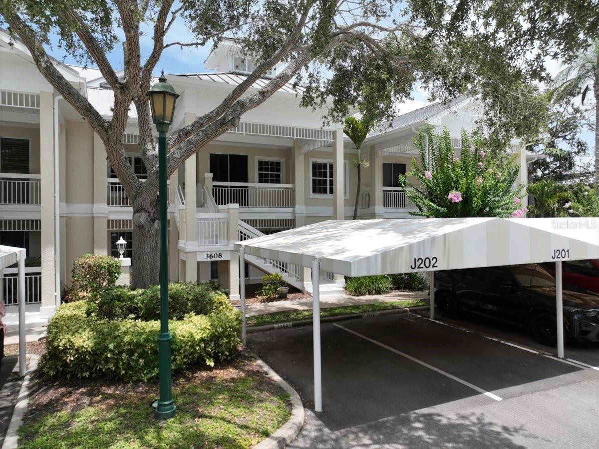 Motivated Seller! This beautifully maintained and thoughtfully updated villa, located within the secure gates of Bollettieri Villas at IMG Academy, presents an exceptional opportunity for those seeking both convenience and functionality. With three spacious bedrooms, three full bathrooms, and an additional bonus room ideally suited for a 4th bedroom, home office, study, or gym, this residence offers over 2,000 square feet of refined living.
The villa is partially furnished and designed for comfort, with cathedral ceilings throughout most rooms, plantation shutters, and remote-controlled Roman shades that blend style with convenience. The living area opens to tranquil views of the surrounding preserve, offering a serene backdrop of privacy and natural beauty. A new canvas awning with a metal frame is scheduled for installation at the end of June, providing the rare luxury of three covered parking spaces—a feature seldom found in the community.
Interior upgrades include an HVAC system (2015) with humidistat and ultraviolet purification to support air quality, a custom-built entertainment center with integrated storage and surround sound, and a fully renovated primary bath featuring a jetted Kohler tub, Silestone wall accent, and a walk in shower with glass enclosure. Crown molding, soffit lighting, diagonal 18”x18” tile flooring, and Silestone surfaces throughout the kitchen and baths all contribute to the home's understated sophistication. Recent updates in 2023 include fresh interior paint, updated ceiling fans, and new light fixtures.
The gated front balcony provides a safe, private outdoor retreat—perfect for morning coffee or an afternoon with your canine companion. Residents enjoy access to a heated community pool, spa, and fitness room, as well as the convenience of a golf cart shuttle and walkable proximity to the IMG campus. The neighborhood also allows for flexible leasing options, with a one-month minimum rental policy.
Just a 10-minute drive to grocery stores and local shopping, and under 30 minutes to the beaches, downtown Sarasota, SRQ Airport, and UTC Mall, this villa offers an ideal blend of comfort, convenience, and quiet sophistication. An especially appealing residence for young athletes and families seeking space, safety, and a strong sense of community.
