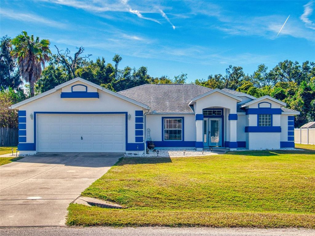 Photo of 7558 SW 103rd Loop, Ocala, FL 34476 (MLS # OM713515)