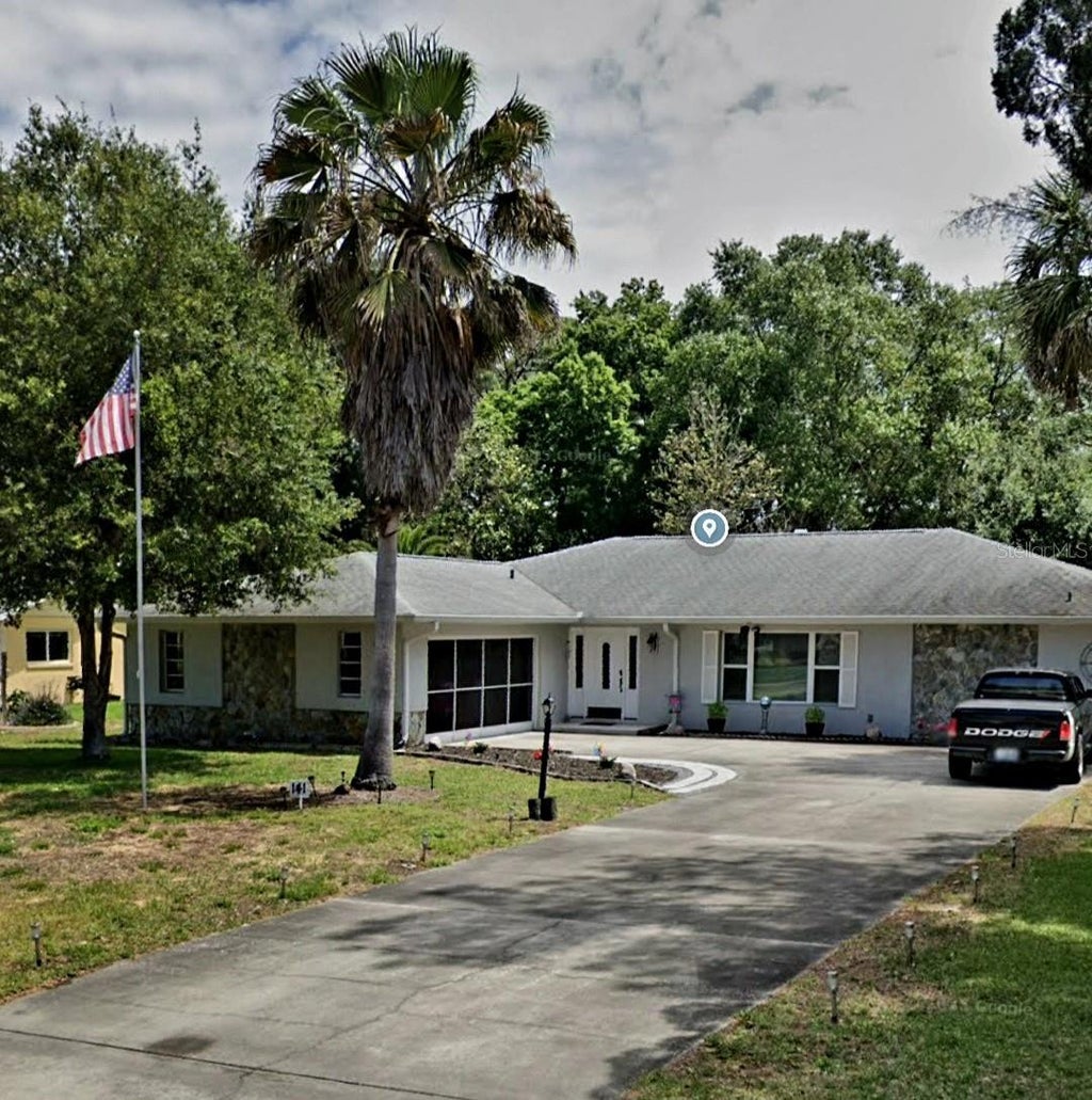 Photo of 141 Douglas Street N, Homosassa, FL 34446 (MLS # OM733733)