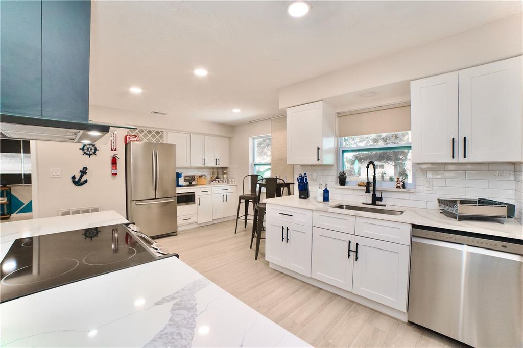 Photo of 6956 300th Avenue N, Clearwater, FL 33761 (MLS # TB8420207)