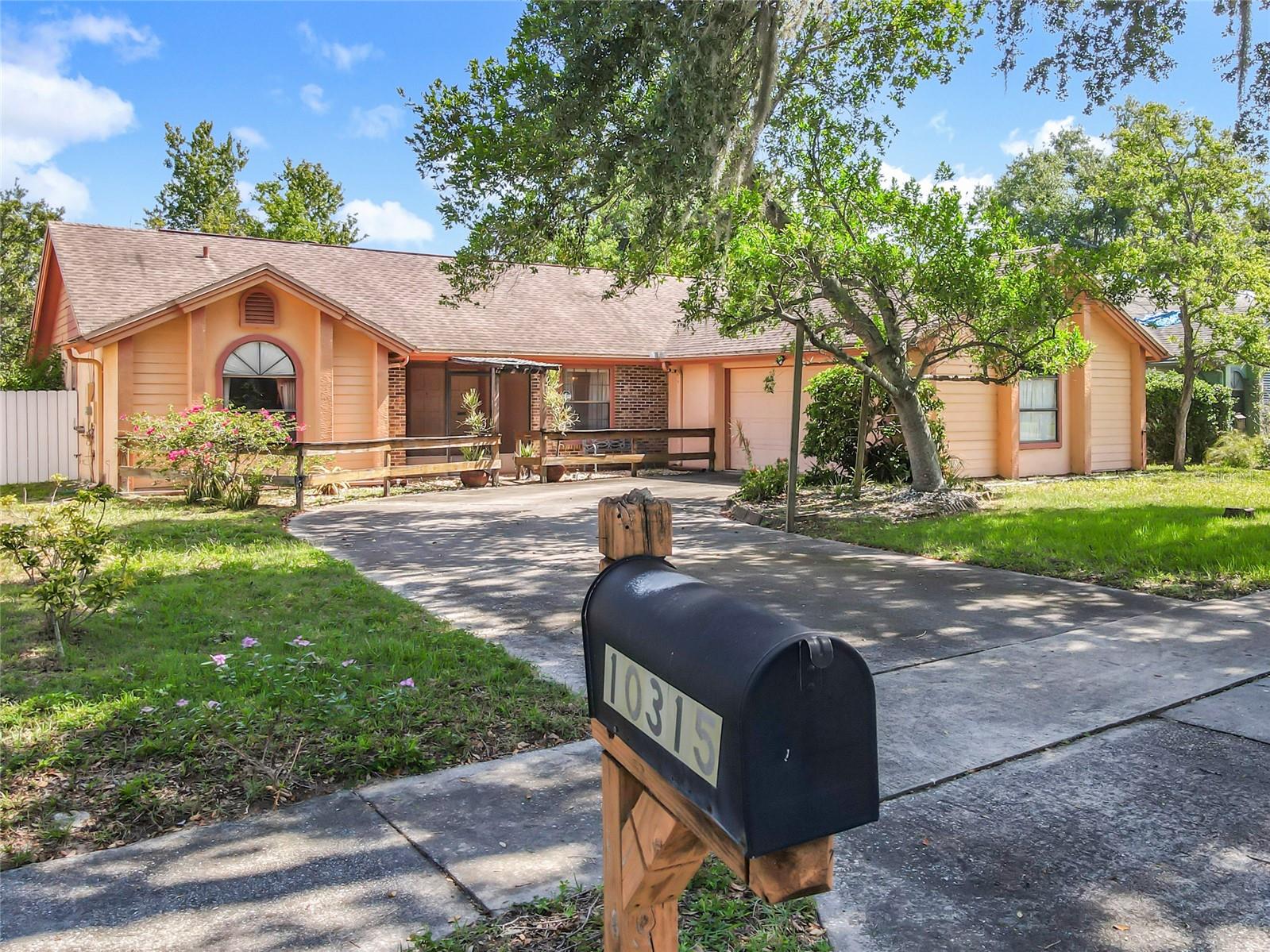 VIEW VIRTUAL TOUR for walk through video. Discover your suburban oasis in one of Orlando's most charming neighborhoods. This 3-bedroom, 2-bath house offers an idyllic setting with the added luxury of your very own in-ground pool, ensuring endless fun in the sun. Boasting a generous .31-acre lot, the property invites you into a world of tranquility with its conservation view and lack of rear neighbors, creating a private haven for you and your loved ones. The spacious, fenced yard is perfect for outdoor activities, while the screened porch and pool area offer a serene retreat. There's even a dedicated patio space, ideal for grilling and entertaining guests. The home's thoughtful design includes a side-entry garage, split bedrooms for privacy, and a cozy wood-burning fireplace in the living room that adds to the ambiance. Vaulted ceilings elevate the atmosphere, while the formal dining room awaits your family gatherings. The master suite is a true sanctuary, featuring a large garden tub for relaxing soaks, a walk-in closet for ample storage, and a breakfast nook that overlooks the pool, perfect for leisurely mornings. The home also includes a convenient indoor laundry room. Location is paramount, and this property does not disappoint. Situated on a quiet, peaceful cul-de-sac, you're just FIVE MINUTES away from the University of Central Florida, close to major roadways like the 417, and minutes from shopping and dining options. The affordable HOA is the cherry on top, making this an opportunity not to be missed. Welcome to comfort, style, and convenience; welcome to your new home.
