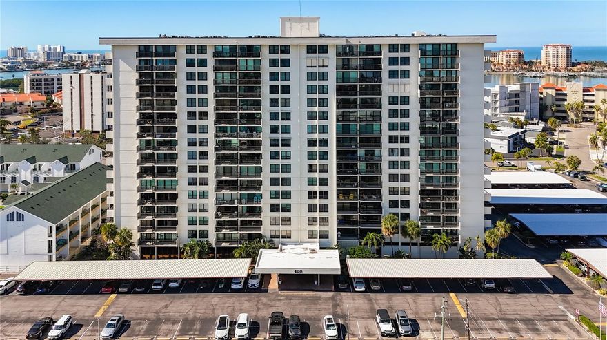 PROPERTY CAN BE FINANCED! CAN BE SOLD FURNISHED! Welcome to Clipper Cove in Island Estates! Experience the best of Clearwater Beach with this beautiful 2 bedroom, 2 bath full updated condo. Located on the 14th floor, this condo offers breathtaking views of the Intercoastal Waterway from your private balcony. Master bedroom features East facing views, 2 large closets & an en-suite bathroom. Open kitchen features a solid stone countertop breakfast bar area for additional dining or entertaining space/seating. Slider doors and windows replaced in 2022. Immerse yourself in the tropical resort-style area of the over-sized, heated swimming pool with jacuzzi, dine & unwind under charming tiki huts, sizzle up a feast on the BBQ grills. Additional building amenities include a party center with billiard table, storage unit (currently being renovated), exercise room with showers & dry saunas for unwinding. A prime placement parking spot, just steps away from the front entrance, conveys with this unit. Short distance to Marina & world-renowned Clearwater Beach that offers boating, water sports, dining, shopping, live entertainment, festivals & much more. Island Estates is an exclusive self-contained community & property is in close proximity to grocery store, pharmacy, banks, restaurants, dry cleaners, nail salons & more. Clipper Cove is located on the Jolley Trolley and public transportation routes & near the Clearwater Marine Aquarium. There is a park/play area around the corner as well. This condo offers the perfect opportunity to enjoy a getaway & all that Island Estates & the beaches have to offer.