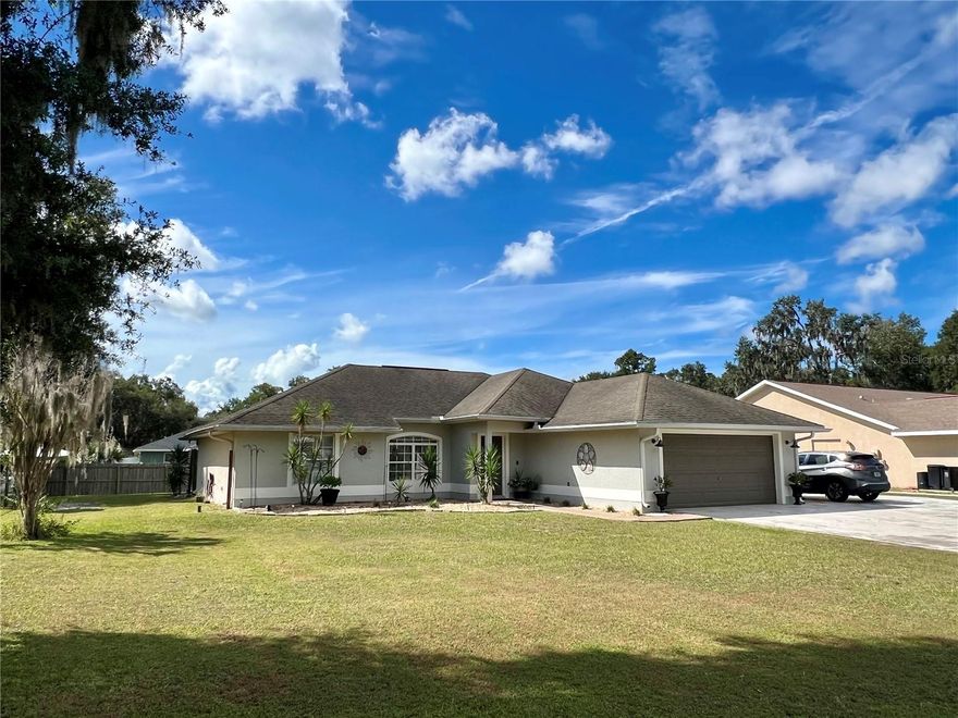MOTIVATED SELLERS!! Discover your slice of Florida living in this beautifully maintained 3-bedroom, 2-bath home tucked into a quiet cul-de-sac in Lake Panasoffkee. This single-family gem offers comfort, style, and versatility. It is the ideal balance of move-in readiness and opportunity. With fresh flooring and lots of space to personalize, it’s ready for you to make it your own. Step outside and you’ll quickly find that the porch is the favorite spot to be — perfect for sipping morning coffee, relaxing in the evening breeze, or simply soaking in the peace and quiet of this tranquil neighborhood. The generously sized lot and expansive driveway accommodate RVS and boats and extra parking spaces. Its location boasts extreme convenience. Being just minutes away, you'll find multiple boat ramps that provide easy access to Lake Panasoffkee-renowned for some of the best fishing in Florida. The lake flows into the scenic Withlacoochee River, where you can enjoy boating, kayaking, and the view of an abundance of native wildlife. Enjoy the small-town charm while still being just minutes from The Villages that hosts free nightly entertainment, golf courses, shopping, dining, and much more! You're also close to Florida’s west coast, offering waterfront dining, kayaking, fishing, beaches, and natural springs for the perfect weekend adventures. Convenient access to I-75 and the Florida Turnpike makes travel to Orlando’s theme parks and major airports a breeze. This home gives the perfect blend of comfort, privacy, and convenience to the Florida lifestyle. Equal Housing Opportunity.