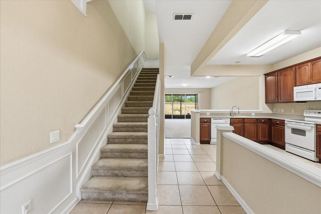 Photo of 2837 Villafuerte Point #103, Orlando, FL 32835 (MLS # O6398569)