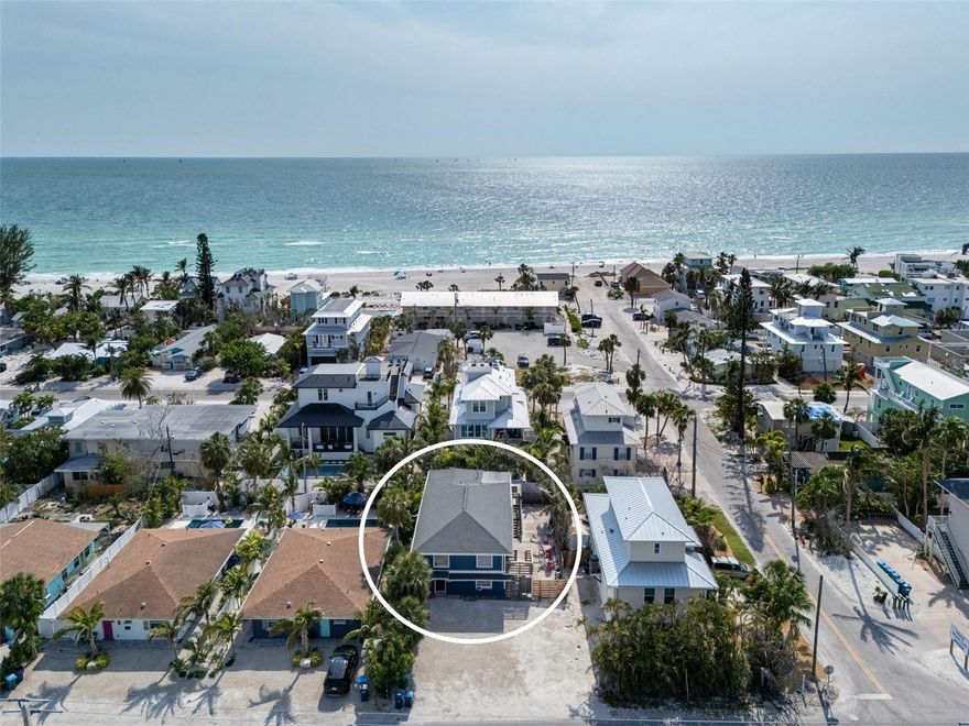 This property is best suited for buyers seeking short-term rental income, a multi-unit investment, or a flexible owner-occupant strategy in a prime Holmes Beach location on Anna Maria Island. This income-producing triplex is located just steps from the Gulf beaches with no busy streets to cross and offers three separate rental units, including a 3-bedroom, 1-bath residence upstairs, plus a 2-bedroom, 1-bath unit and a studio apartment on the main level, allowing for multiple income streams, full-time investment use, or a live-in-one, rent-the-others approach. Currently operating as an active short-term rental, the property benefits from strong year-round demand driven by its proximity to the beach, dining, and entertainment near Bridge Street, as well as convenient access off the island via the Manatee Avenue Causeway. The central location also provides easy reach to IMG Academy, University Town Center, Lakewood Ranch, Downtown Sarasota, and both Sarasota-Bradenton International Airport and Tampa International Airport, making it attractive for owners, guests, and investors alike. Whether held as a turnkey short-term rental, positioned for a 1031 exchange, or used as a coastal residence with income, this Holmes Beach triplex offers a rare combination of location, flexibility, and proven rental performance.