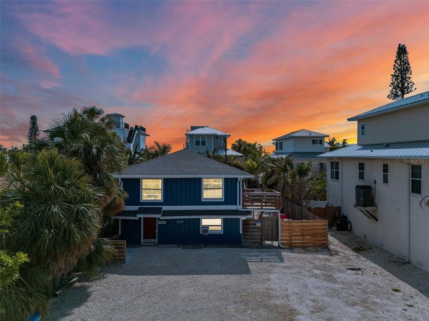 Welcome to a rare investment opportunity on Anna Maria Island. A coveted triplex in the heart of Holmes Beach. No need to cross busy streets, his gem is steps to the island’s world-famous Gulf beaches and minutes from the vibrant Bridge Street. One of the few multi-unit properties available on the island, this income-producing triplex offers exceptional flexibility and long-term potential. Currently operating as an active short-term rental, it features three well-appointed units: a spacious 3-bedroom, 1-bath residence upstairs, plus a 2-bedroom, 1-bath unit and a studio apartment on the main level — perfect for owner occupancy or generating multiple rental incomes. Guests love the convenient location near the Manatee Avenue Causeway for easy access to Bradenton, as well as nearby shopping, dining, and entertainment. Whether you’re looking to live in one unit and rent the others, expand your investment portfolio, or create your own coastal retreat, this triplex offers unmatched potential in one of Florida’s most desirable Gulf Coast beach communities.